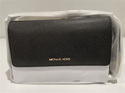 michael kors 35s9gtvc3l 3in1 clutch xbody leather blossom|Michael Kors saffiano crossbody.